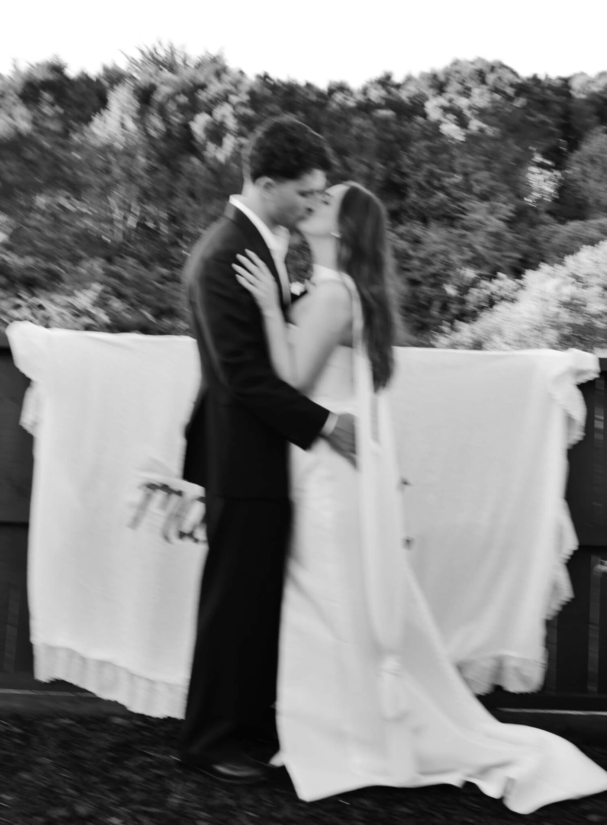 A couple embracing at their wedding