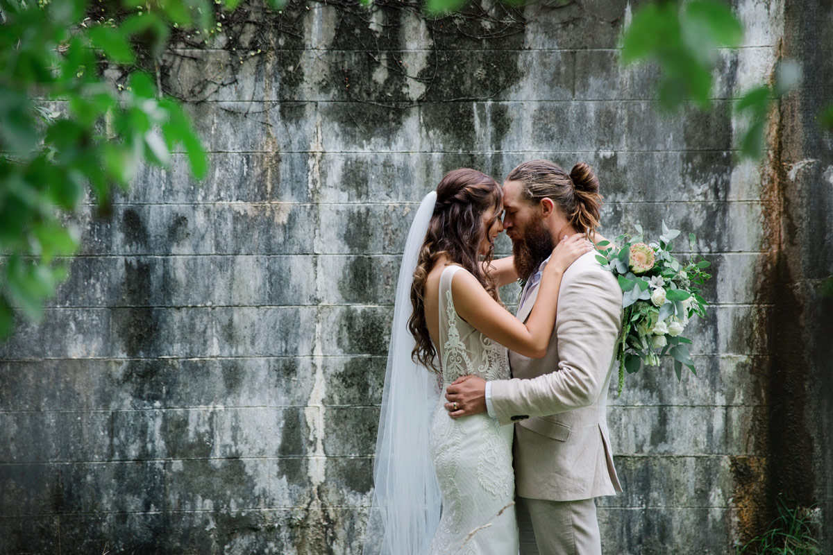 Amanda+Zane Benedetti Wedding Dress Veil Bouquet Hug Profile 0639