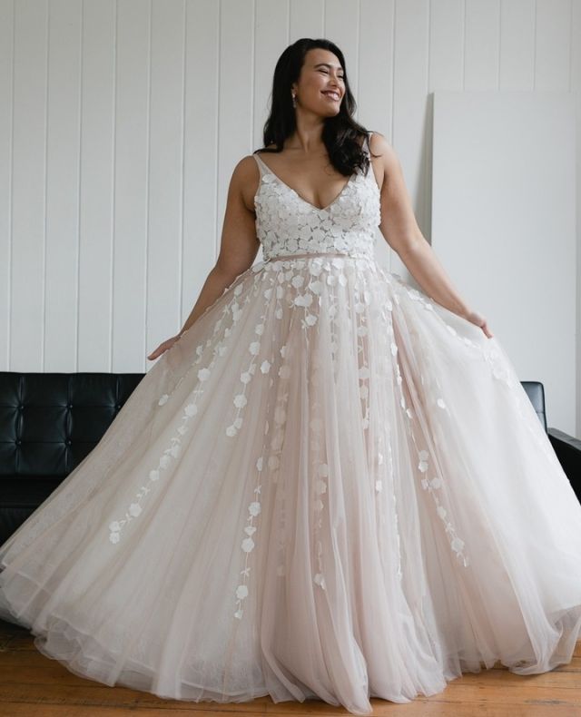Modern, Opulent and Romantic. Fall for Lavant and its translucent bodice. Designed for curves, a narrow band emphasises the waist, while layers of fine ivory tulle form a full, sweeping skirt and train.⁠
⁠
